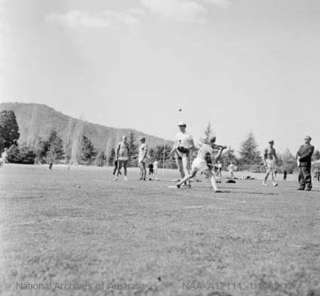 At Canberra's Albert Hall, Ainslie Oval and two gymnasiums, they competed in cultural and sports contests. Melbourne's Sisu 1962 Sports Club pitcher A Veijalainen throws a twister for Veikko Hauvistole, Sydney in the Finnish baseball competition, Sydney were festival champions - Canberra 1965